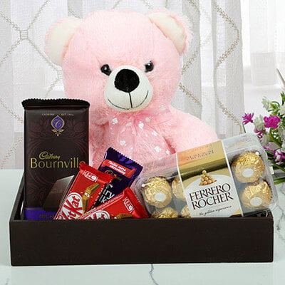 Teddy bear with chocolates
