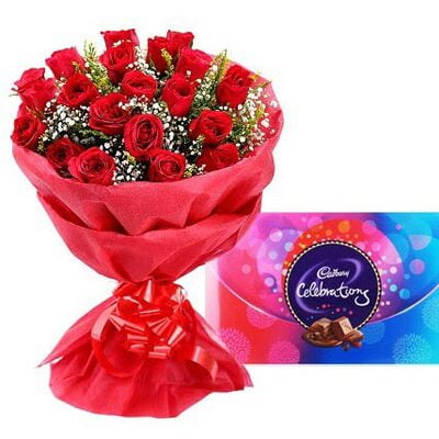 Red roses with cadbury celebration